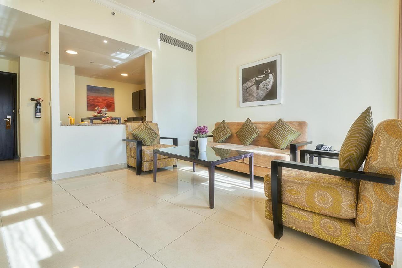 Bahi Ajman Palace Hotel Exterior foto Living room
