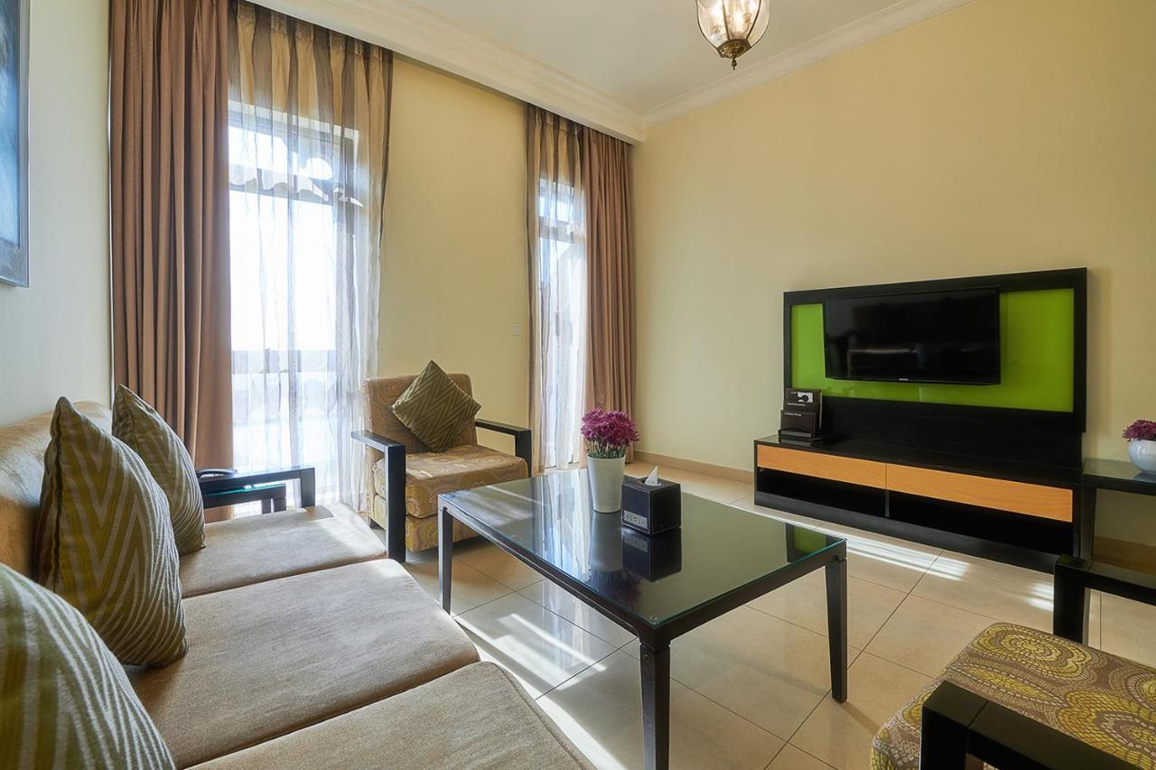 Bahi Ajman Palace Hotel Exterior foto Living room