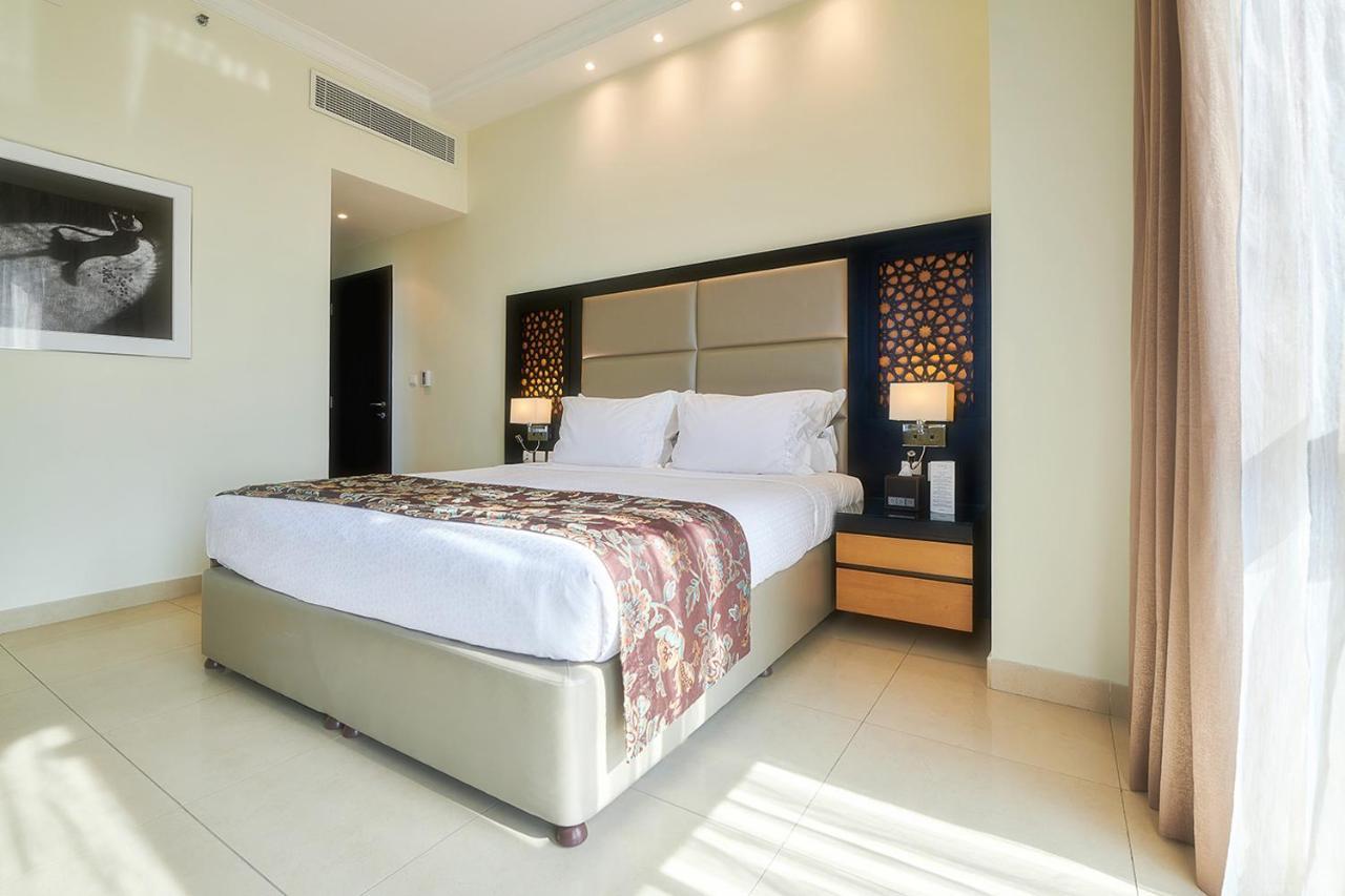 Bahi Ajman Palace Hotel Exterior foto A bedroom at the hotel